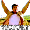 arduinna: Darien Fawkes of Invisible Man with both fists up over his head in a victory shout (Darien-victory)