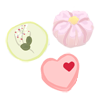 three Japanese sweets with a heart