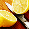 watersword: A lemon, cut in half, and a knife. (Stock: lemon)