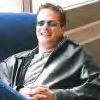 starfish: Paul Gross, in sunglasses and leather jacket (Comfy chair)