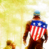 longwhitecoats: Captain America in his uniform and soldier's helmet, walking away from the camera with his old shield on his back (Cap Old Shield)