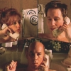 sharpest_asp: The trio are all on the phones in their separate baths (X-Files: Scully Mulder Skinner)