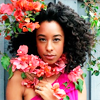 timeasmymeasure: corrine bailey ray with flowers in her hair (corrine: flowers in my hair)