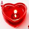 meloukhia: An ace of hearts, with a heart-shaped candleholder carrying a lit tealight centred on the card (Ace love)