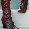 timeasmymeasure: close-up shot of a pair of sexy red and black boots coming down the stairs (stock: these boots)